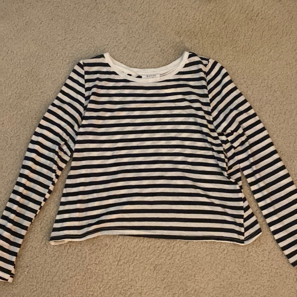Black and white asymmetrical long-sleeve size M